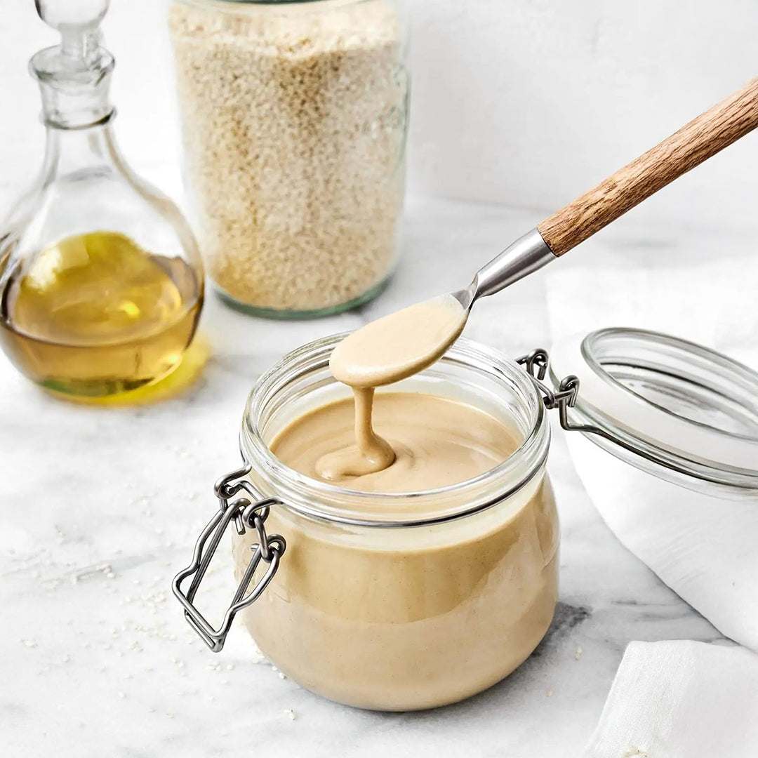 Envase de Tahina Tahini Crema de Ajonjoli premium de 454g con textura cremosa