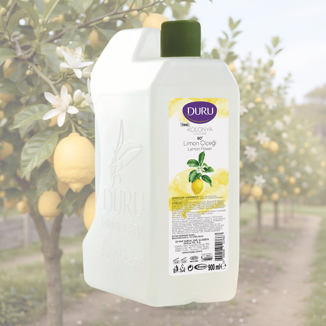 Colonia Duru Limon en envase blanco de plástico con tapa verde y etiqueta amarilla ilustrada con limones.